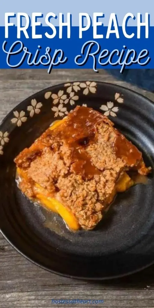 Slice of fresh Peach Crisp sitting in a bowl.