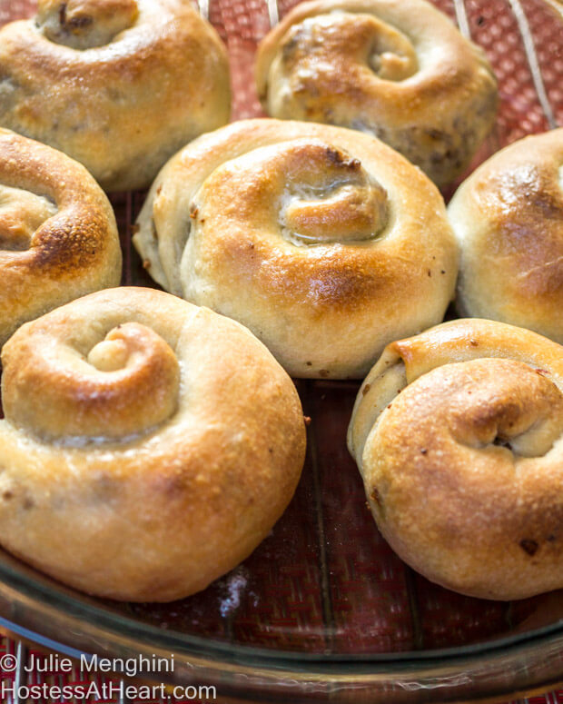 Stuffed meat pies in a swirl shape.