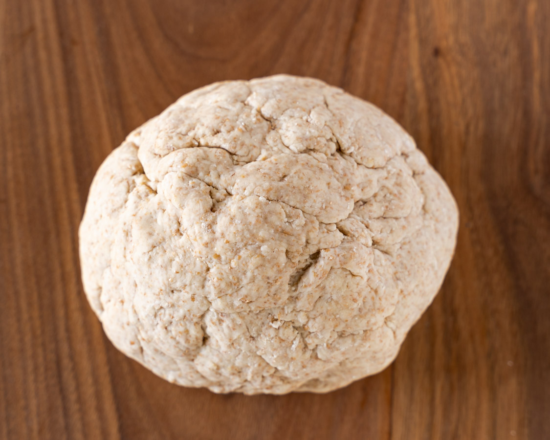 Bread dough pressed into a tight ball.