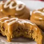 Spiced Coffee Cookies With Caramel Vanilla Glaze are tender and delicious with a soft and gooey caramel. These cookies are like a delicious coffee latte. | HostessAtHeart.com