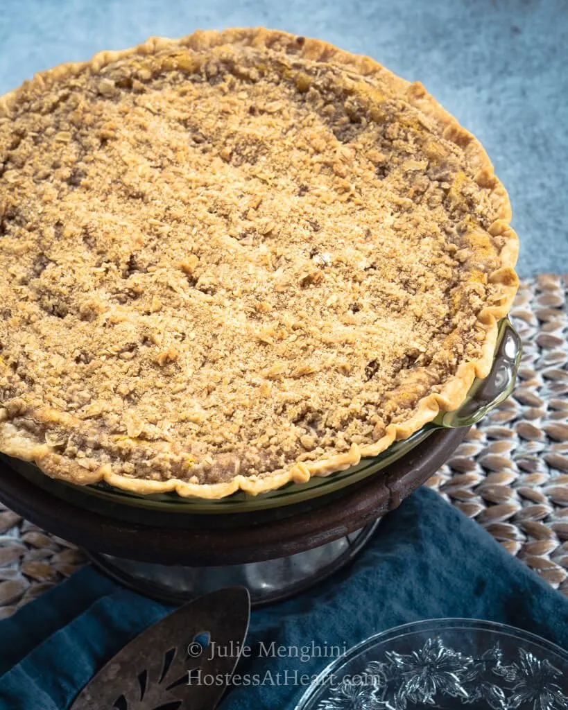 Top view of a whole pumpkin cheesecake pie