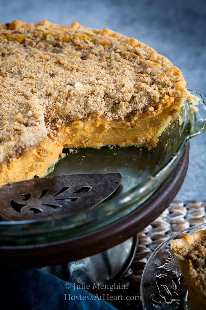 Cut view of a pumpkin cheesecake pie