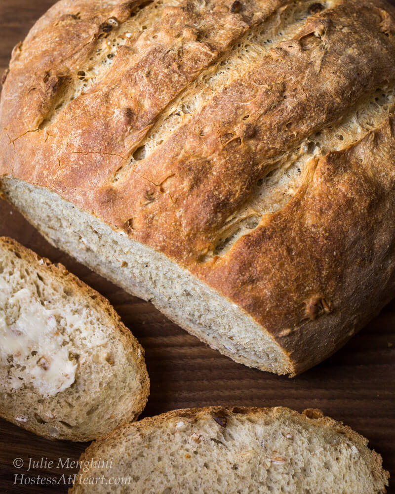 Simple Rustic Loaf of bread that's been sliced. Hostess At Heart
