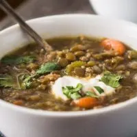 Lentil Sausage Soup is a delicious high protein soup that takes less than an hour to make but tastes like it cooked all day