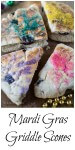 Slices of scones decorated with colored sugar with gold beads sitting in the front for Mardi Gras.