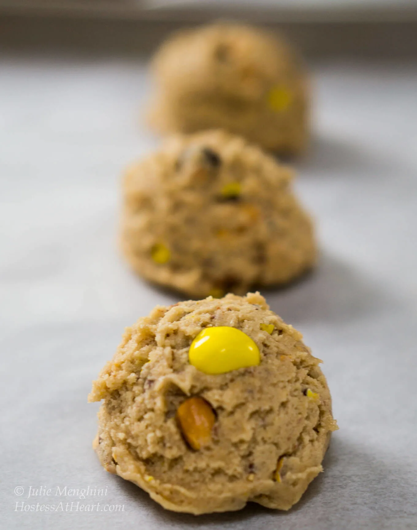 M&M's® Honey Nut Cookies taste like a big ole hug. They are warm from the fresh honey and the delicious flavor of the M&M's® Honey Nut candy gives these cookies a sweet nutty flavor | HostessAtHeart.com