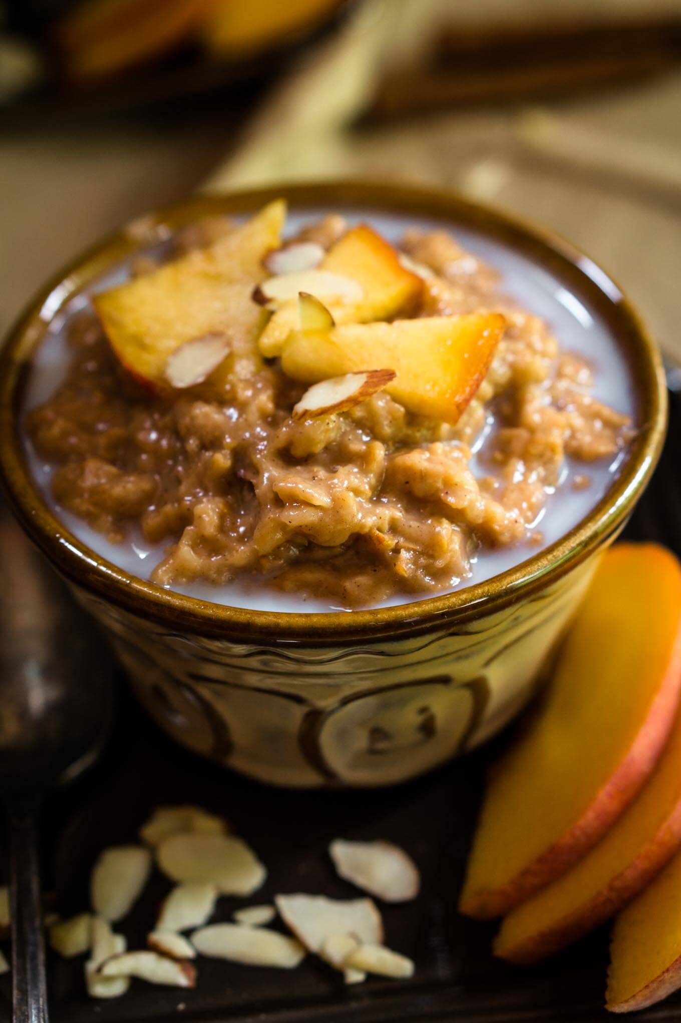 Crockpot Steel Cut Oats & Bulgur is like waking up to a warm cinnamon hug. It's great as is or with fruit, nuts, and a drizzle of milk or cream. It makes several servings and freezes well | HostessAtHeart.com