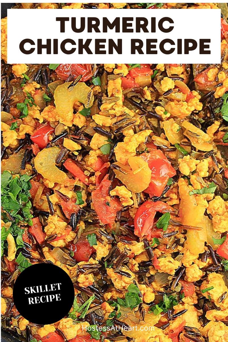 A titled image for Pinterest: A skillet filled with Turmeric Chicken with wild rice, red pepper, onion, celery and garnished with parsley - Hostess At Heart