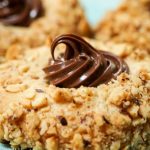 Nutella Filled Hazelnut Thumbprint Cookies - Hostess At Heart