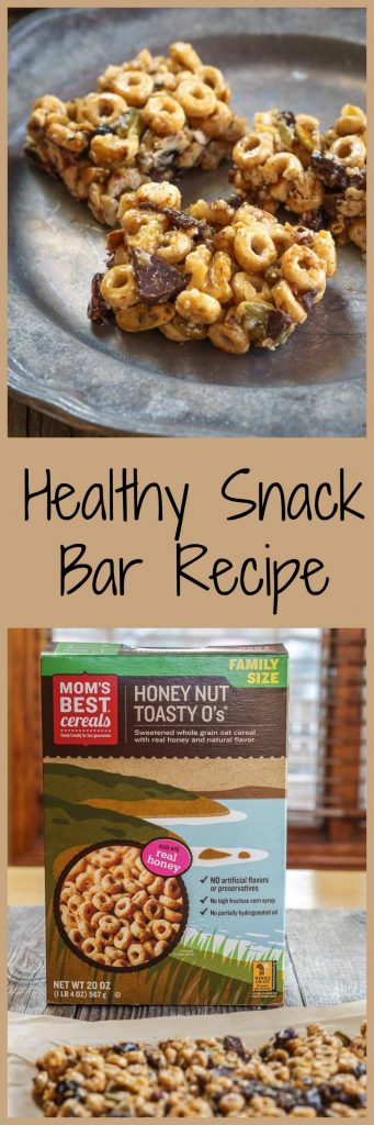 Two photo collage for Pinterest of three bars made from honey, whole-grain cereal, and chocolate chunks sitting on a metal plate. The bottom photo shows the box of whole-grain cereal. The title \"Healthy Snack Bar Recipe\" runs through the center.
