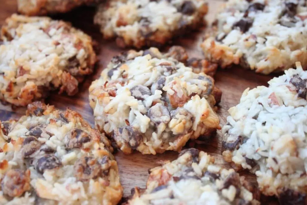 A close up of cookies made with almond joy candy bars.