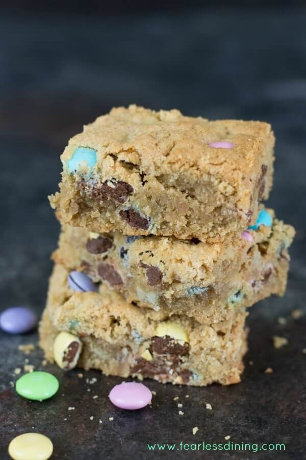 Cookie bars filled with pastel m&m\'s.