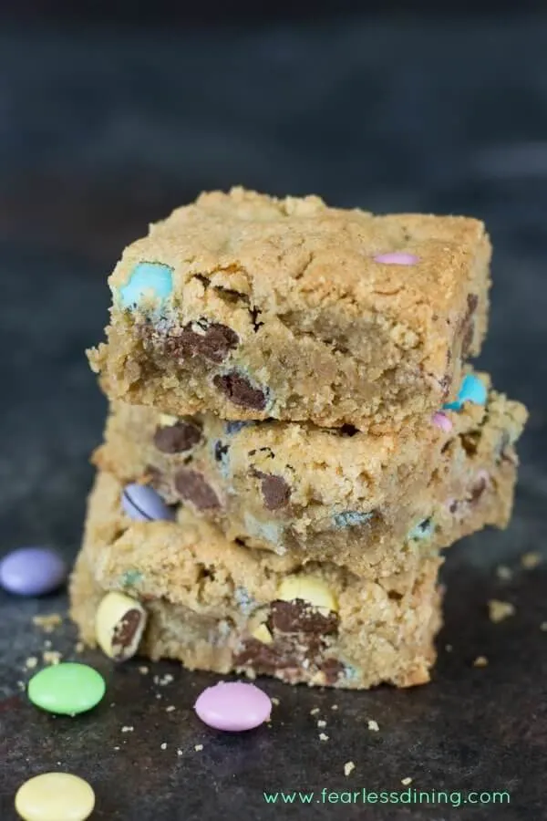 Cookie bars filled with pastel m&m\'s.