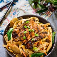 Saucy Thai Basil Chicken Noodle Bowl Recipe is a creamy blend of Asian flavors.  It's a little bit sweet and spicy and a whole bunch delicious! | HostessAtHeart.com
