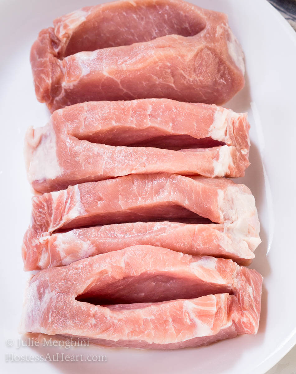 Food isn't just food when you add layers of flavor with quality ingredients.&nbsp; Gouda Cheese and Apple Stuffed Pork Chops are like a party of the senses and more of an experience than a meal. #ad | Hostessatheart.com