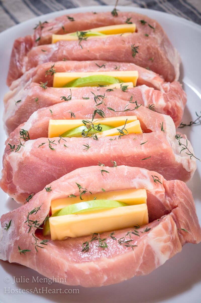 Food isn't just food when you add layers of flavor with quality ingredients.&nbsp; Gouda Cheese and Apple Stuffed Pork Chops are like a party of the senses and more of an experience than a meal. #ad | Hostessatheart.com