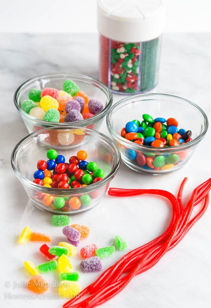 Bowls of candy used to make Christmas cake ornaments.