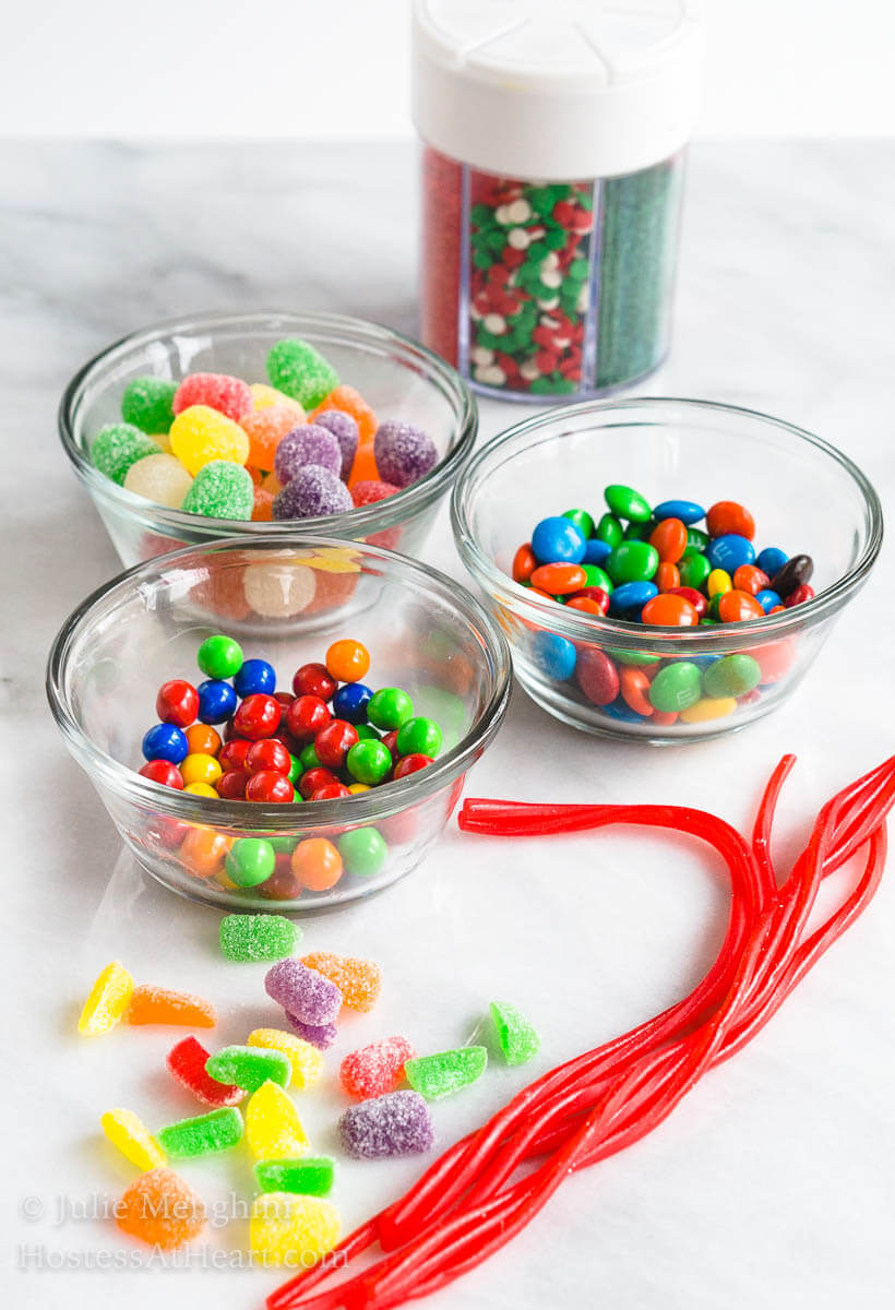 Bowls of candy used to make Christmas cake ornaments.