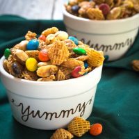 This Addictive Caramel Crispix Snack Mix is so good that people will ask you not to make it.  One batch will keep you and a ton of your friends munching all day long! | HostessAtHeart.com