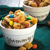 This Addictive Caramel Crispix Snack Mix is so good that people will ask you not to make it.  One batch will keep you and a ton of your friends munching all day long! | HostessAtHeart.com