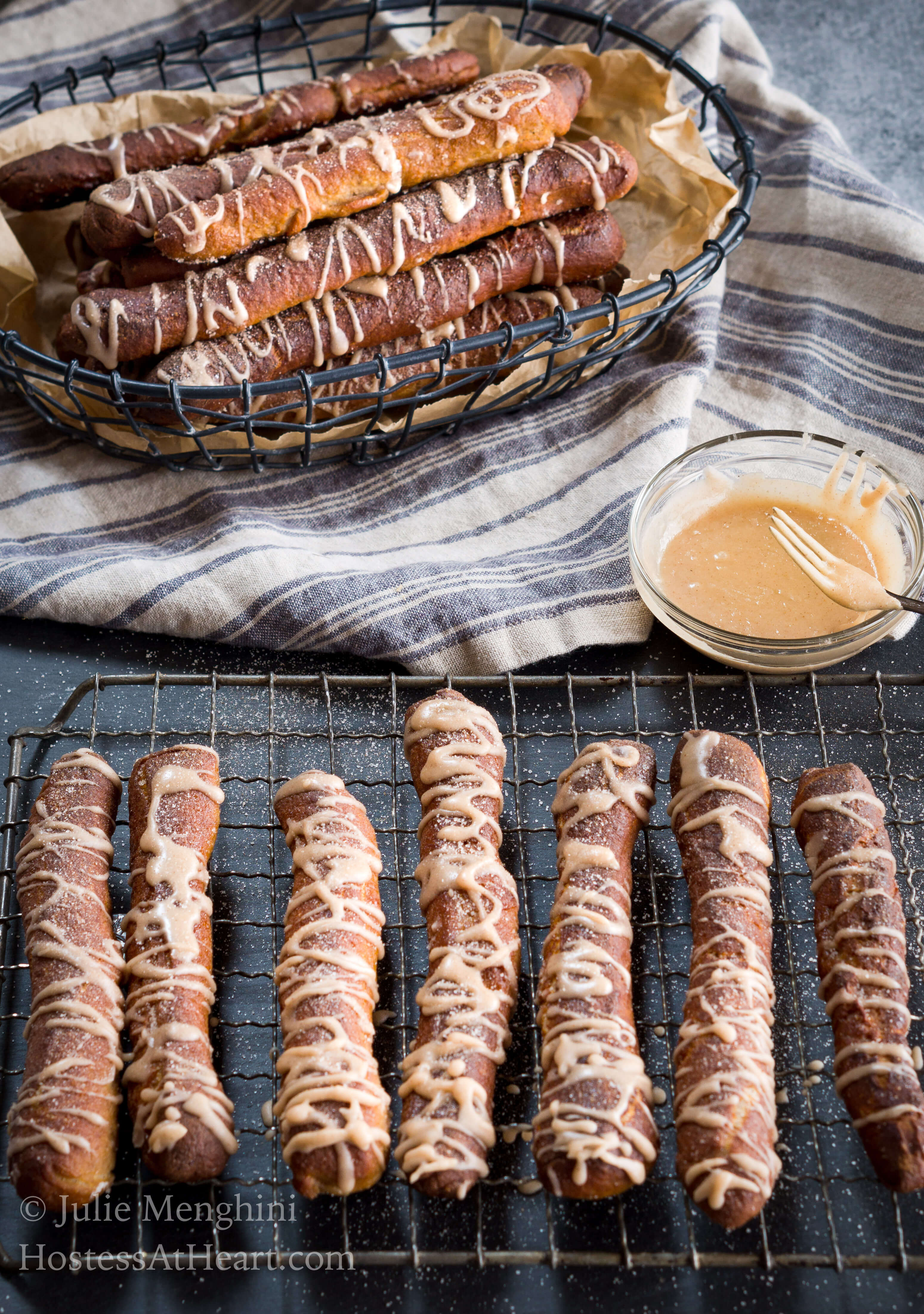 Cinnamon Sugar Soft Pretzel recipe is a made with a pretzel dough slightly sweetened with brown sugar and warm cinnamon and finished with a cinnamon glaze drizzle. | HostessAtHeart.com Cinnamon Sugar Soft Pretzel Recipe