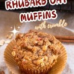 Image for Pinterest of a baked rhubarb muffin topped with oats and crumble - Hostess At Heart