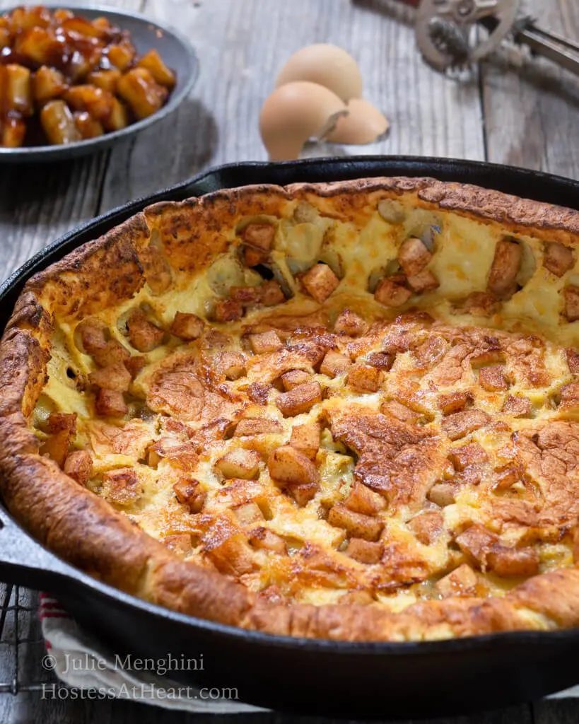 Close up of whole Apple Dutch Baby pancake pan