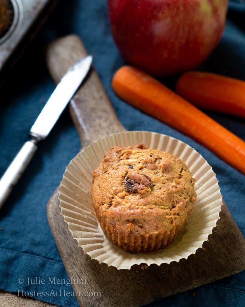 Distant top view of Harvest muffin with carrots and knife