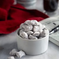 Side view of puppy chow with pieces next to the bowl