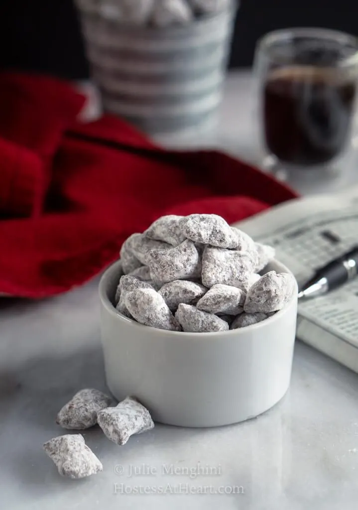 Side view of puppy chow with pieces next to the bowl