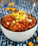 Down Home Chili No Beans Recipe is a spicy tomato stew loaded with pork and beef, peppers and onions.