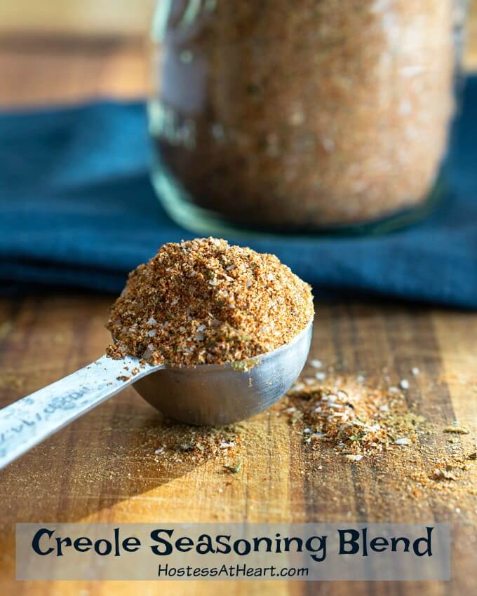 A loaded tablespoon of blended herbs and spices that make up an amazing Creole Seasoning blend.