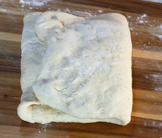 Ciabatta bread is stretched and folded.