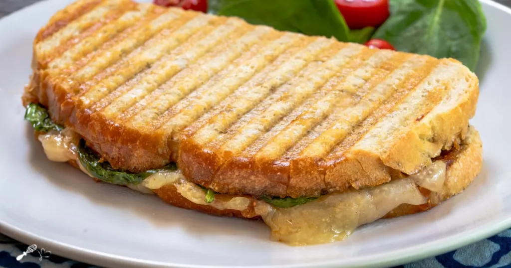 https://hostessatheart.com/wp-content/uploads/2019/06/Manchego-Grilled-Cheese-SM-Feature-1200x630-Image-1024x538.png.webp