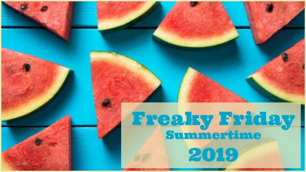 Blue wooden background with slices of watermelon scattered on top with Freaky Friday summertime banner