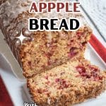 Front view of a loaf of sliced cranberry bread topped with streusel and glazed.