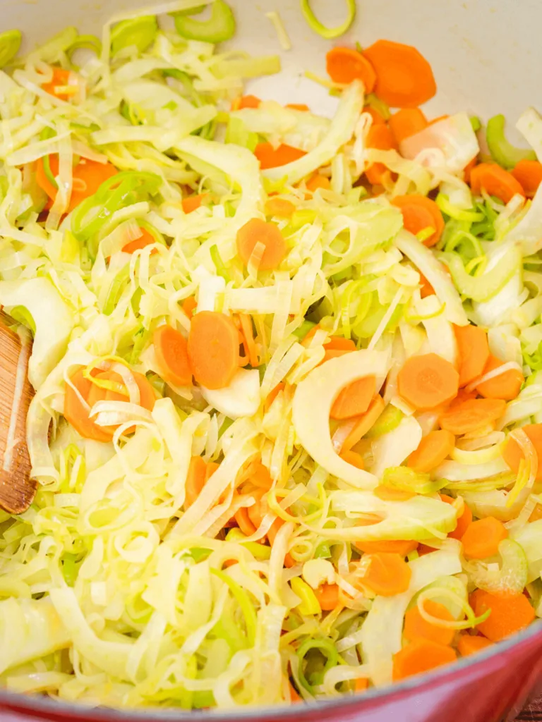 A pan of colorful cooked vegetables to show when to stop cooking them for an al dente texture.