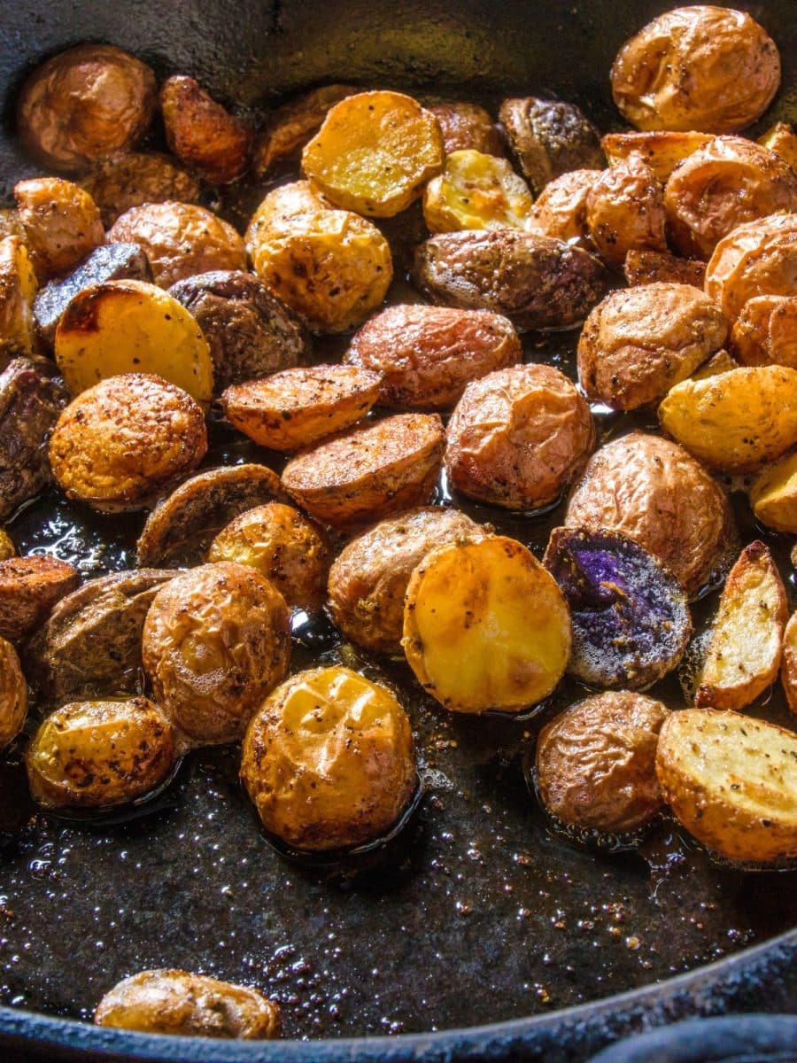 Brown fried potatoes in a skillet Hostess At Heart