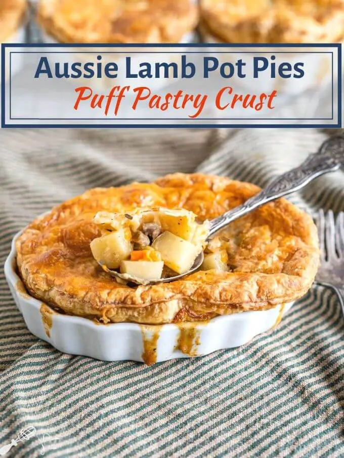 White ramekin filled with a lamb pot pie topped with golden puff pastry and filling spilling down the sides. A spoon of the ingredients is scooped from the center. The dish sits on a green-striped napkin with an antique fork next to the dish. The title runs across the top of the photo.
