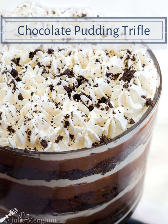 Top angle photo of a chocolate pudding layered pudding showing the top which was piped in whipped cream stars and dusted with chocolate cookie crumbs. The title banner runs across the top.