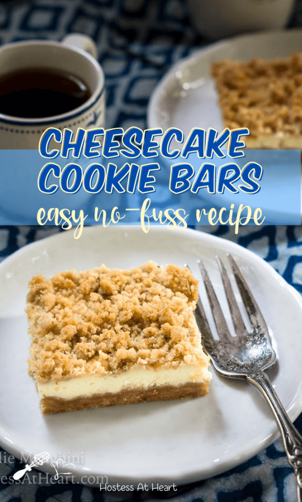 3/4 angle of a cheesecake cookie bar sitting on a white plate with a cup of coffee and another bar sitting in the background.