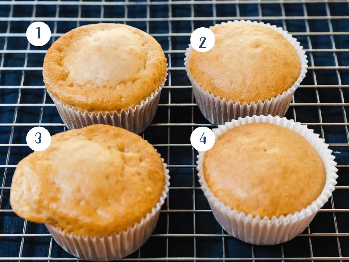 Cooling rack with 4 muffins showing what a proper baked muffin looks like.