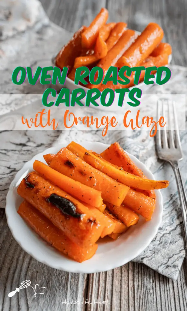 Top angle photo of slices of roasted carrots in a white bowl. A second dish sits in the background.