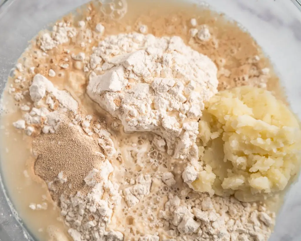 Bread ingredients combined in a bowl.