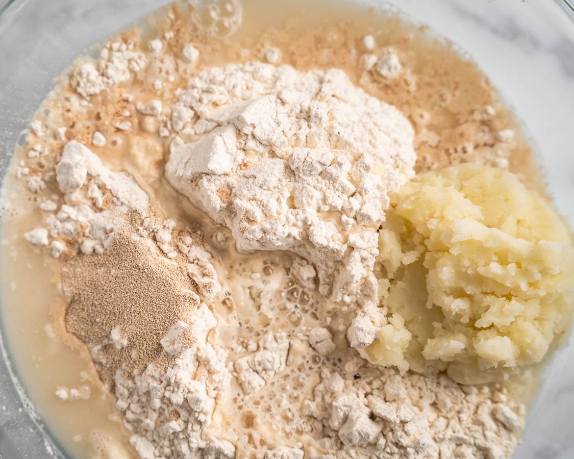 Bread ingredients combined in a bowl.