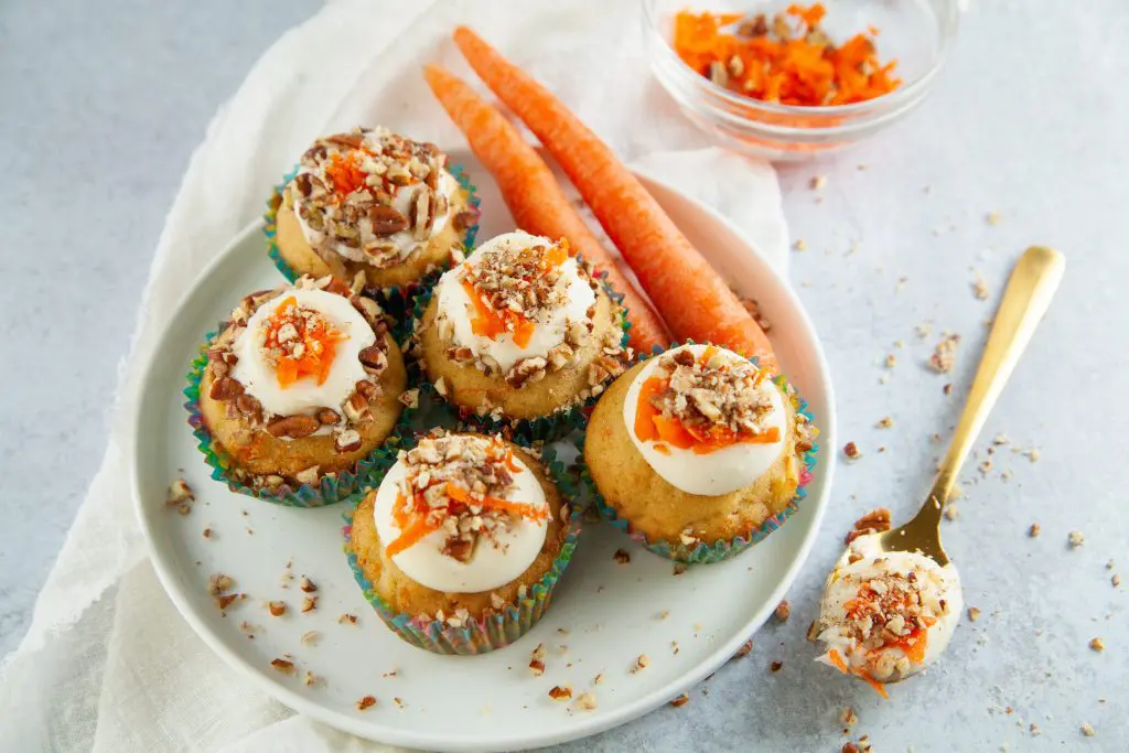 carrot cupcakes on a platter.