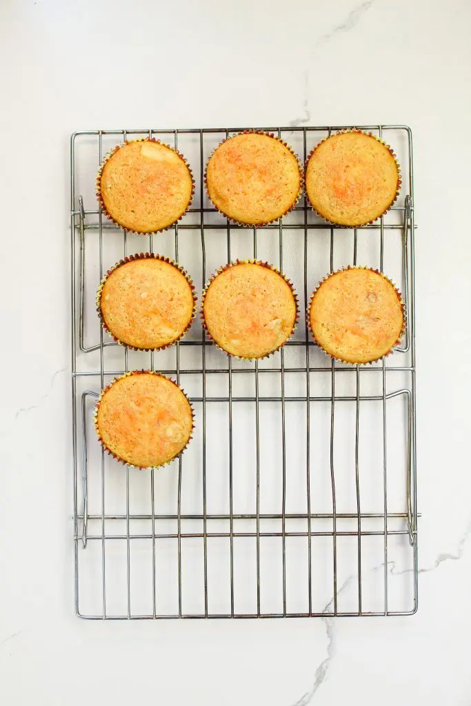 cupcakes cooling on a rack.