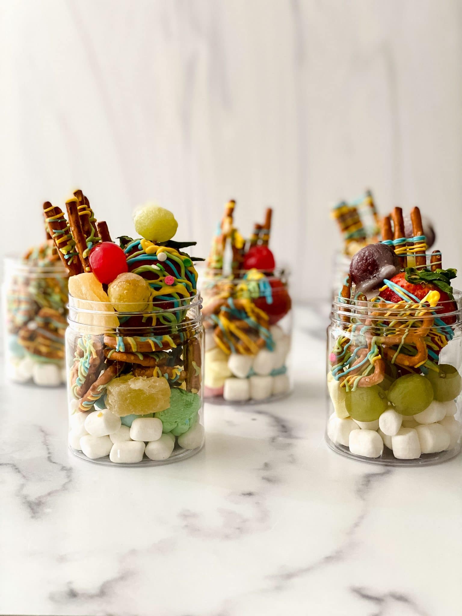 jars filled with sweet ingredients for jarcuterie.