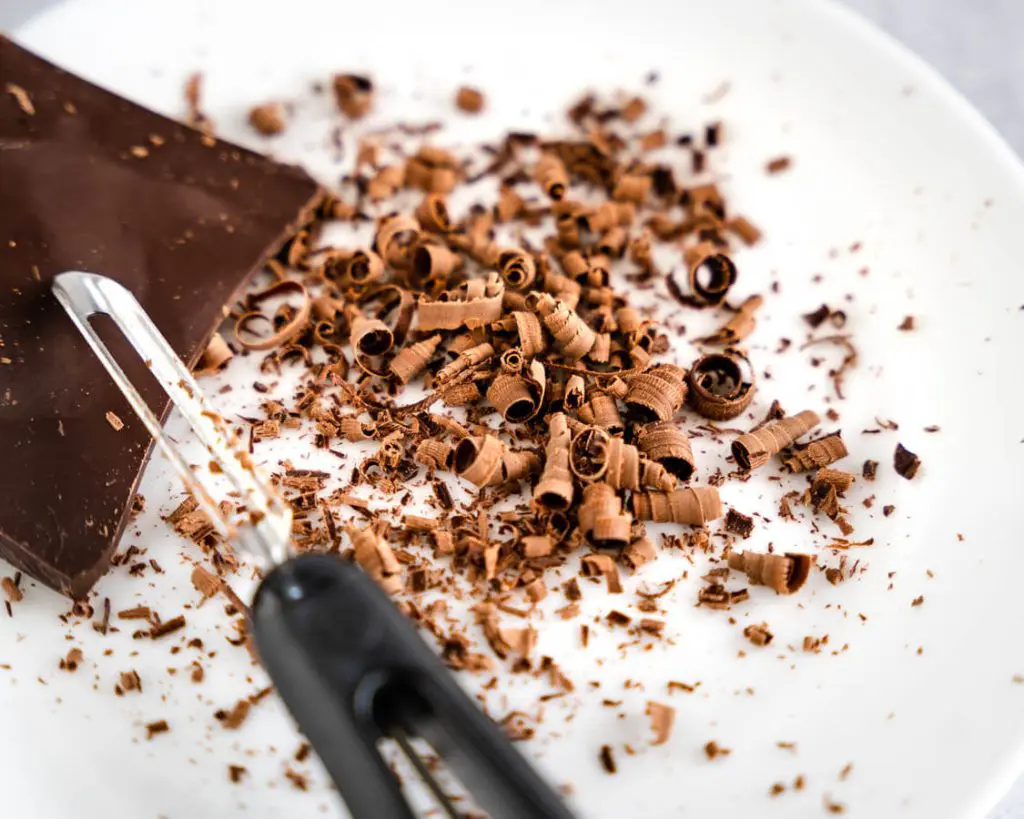 Chocolate shaving curls on a plate