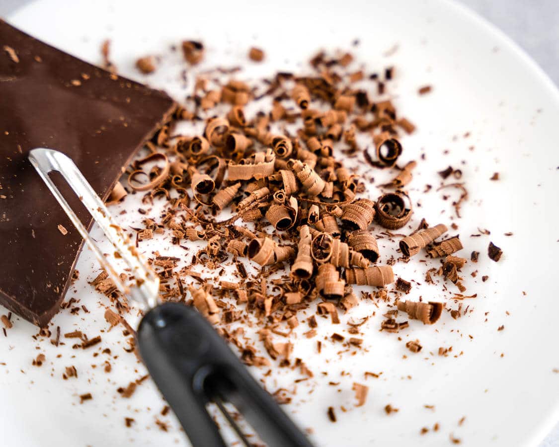 Chocolate shaving curls on a plate